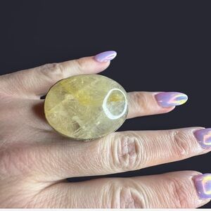 Urban Outfitters Yellow Stone Ring in brass colored setting rounded stone